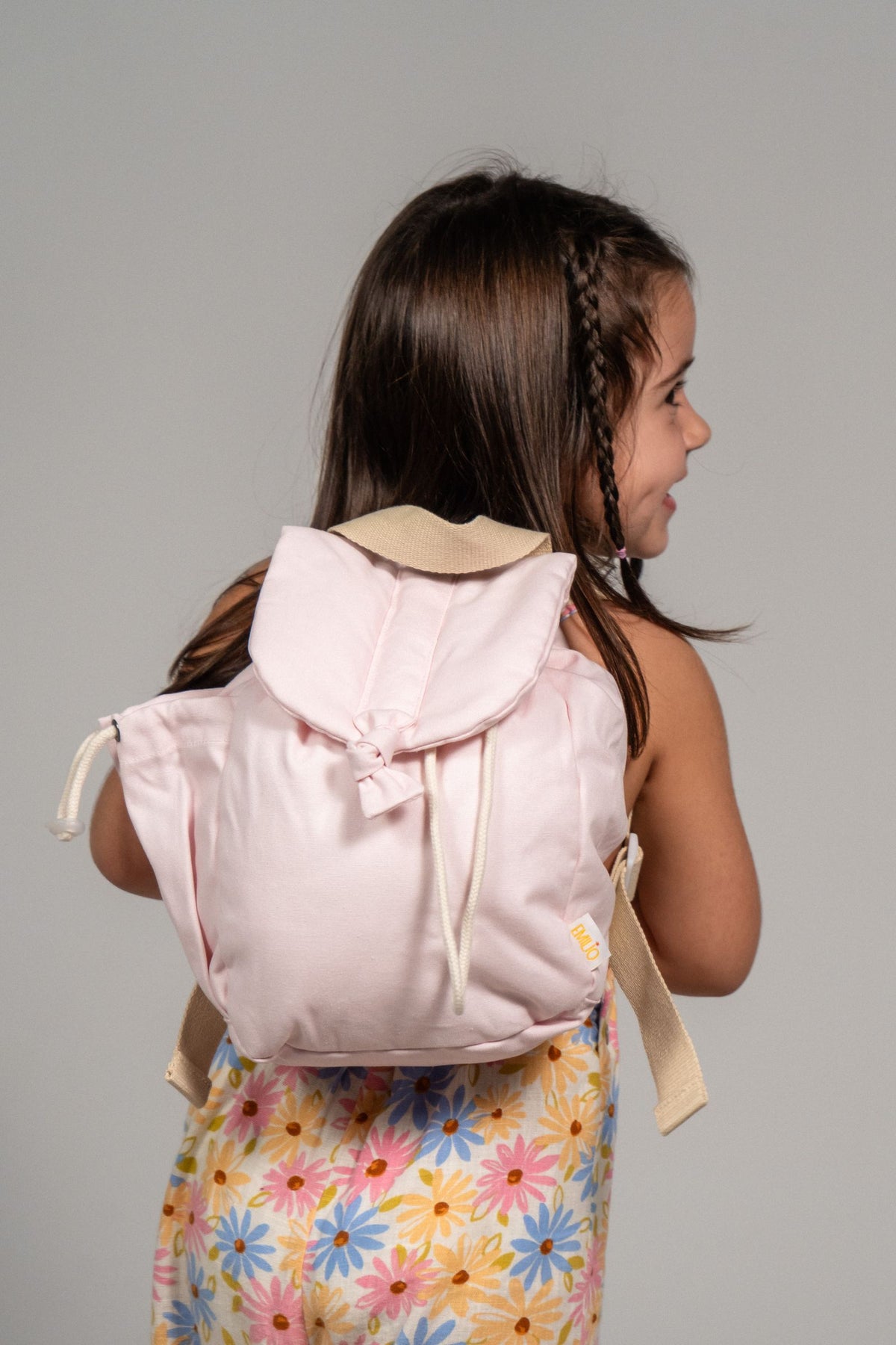 Girl with a pink Emilio backpack